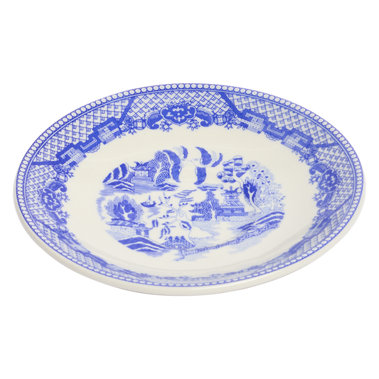 White plate with blue decorative border and central scene on a white background