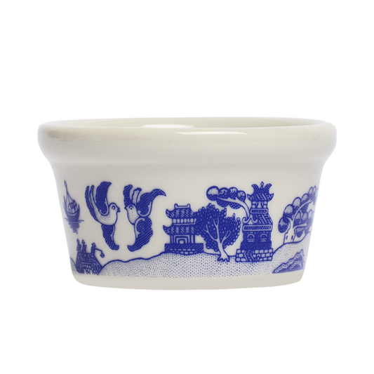 White bowl with blue decorative patterns on a white background