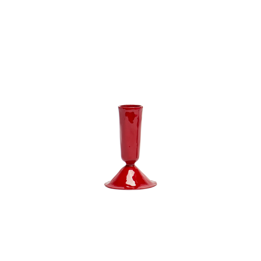 Red glass vase on a white background