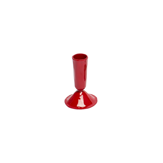 Red candle holder on a white background