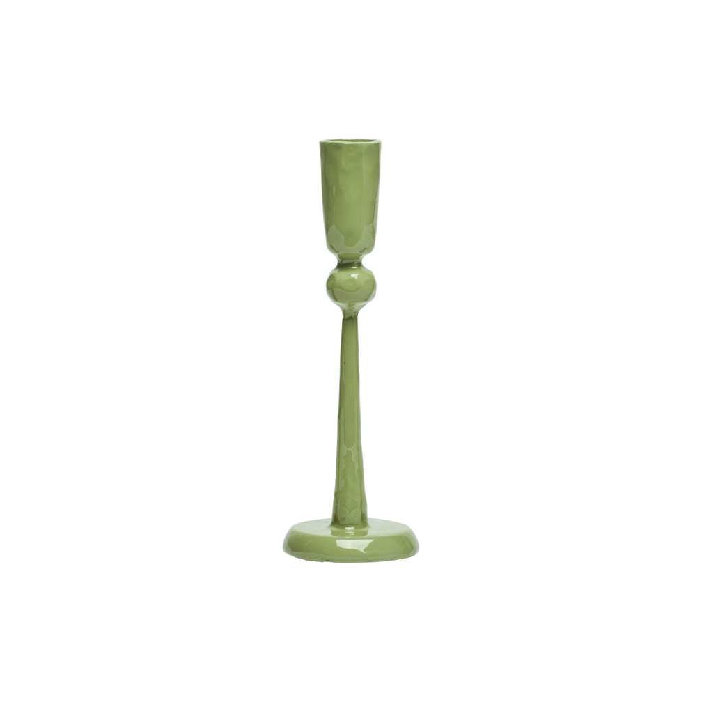 Green candle holder on a white background