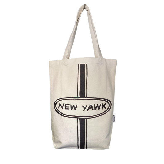 Beige tote bag with 'NEW YAWK' text and black stripes on a white background