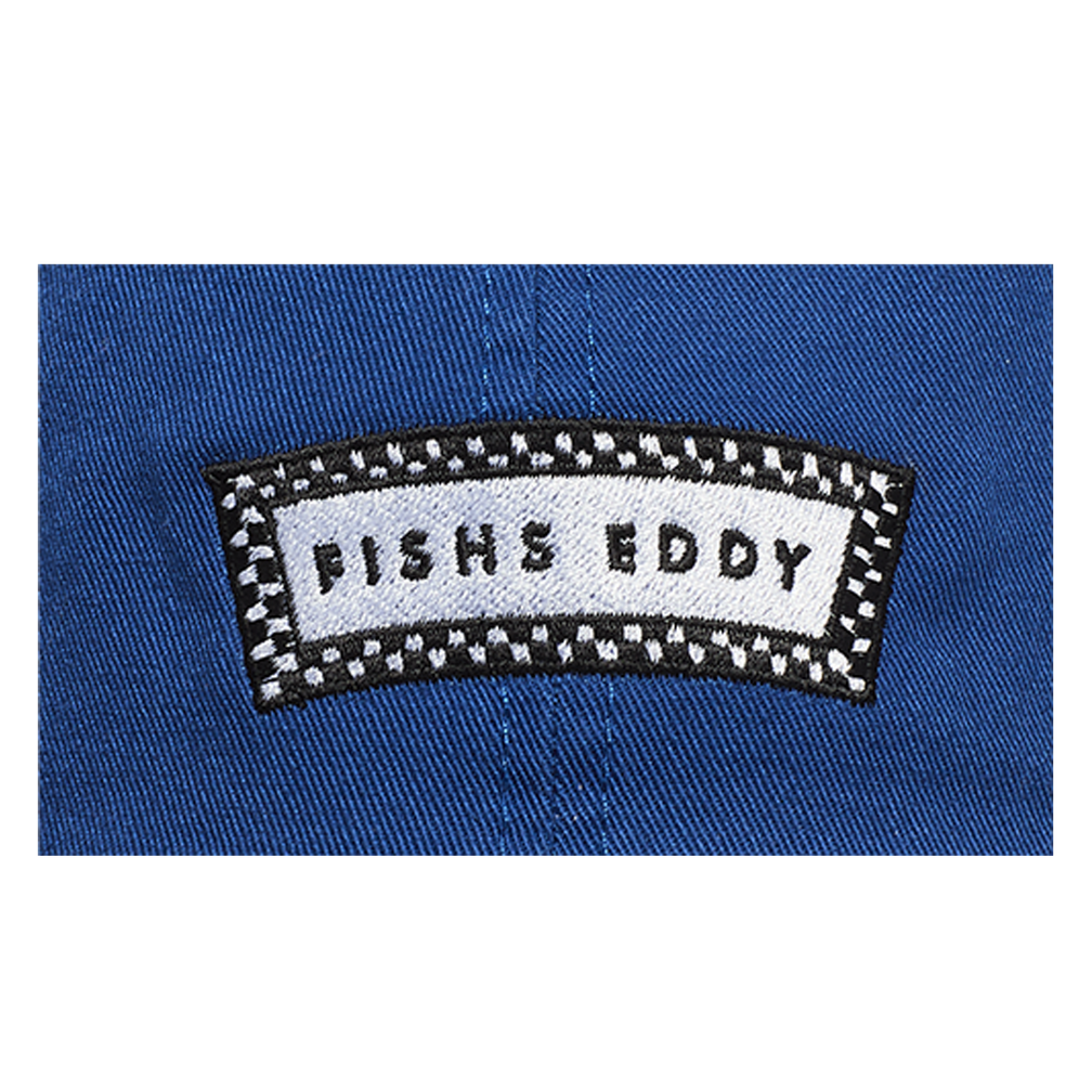 Patch with 'FISHS EDDY' text on a blue background