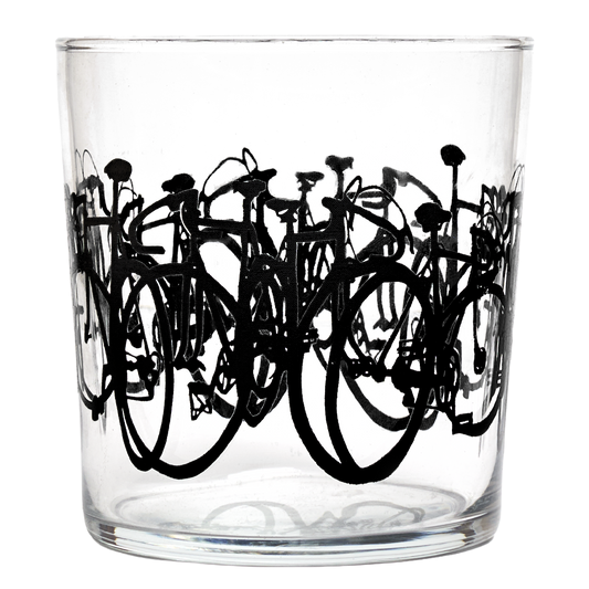 Clear glass tumbler with black bicycle illustrations on a white background