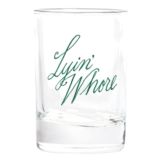 Pleasantries Lyin Whore Shot Glass with humorous graphic design, an easy addition to any modern table setting
