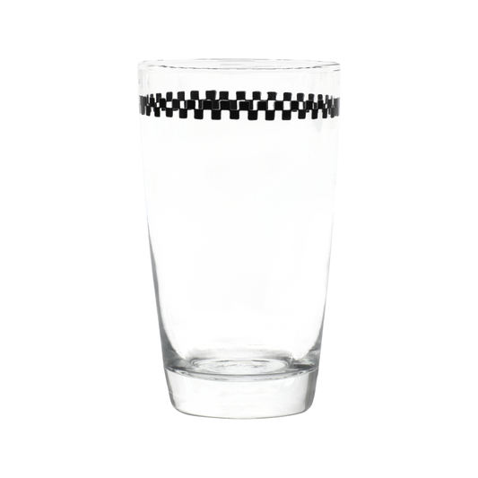 Clear glass with a black and white checkered band around the rim on a white background