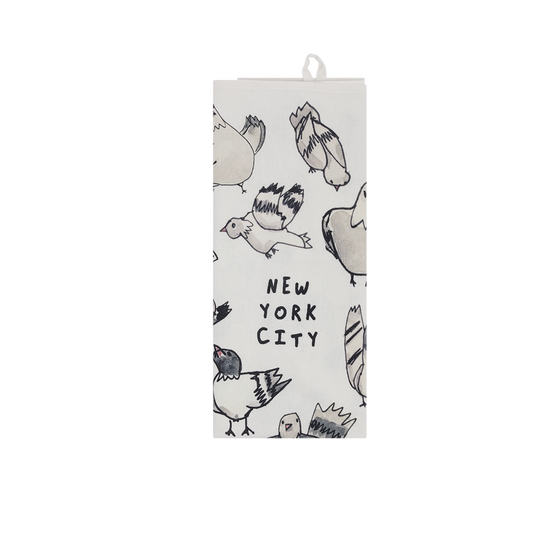 Folded NYC Pigeons tea towel showing hand-drawn pigeons around “New York City” lettering