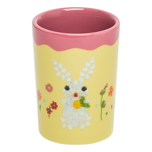 Close-up of Fishs Eddy x Susan Alexandra Bun Bun Cup, cup with illustrated design by Susan Alexandra