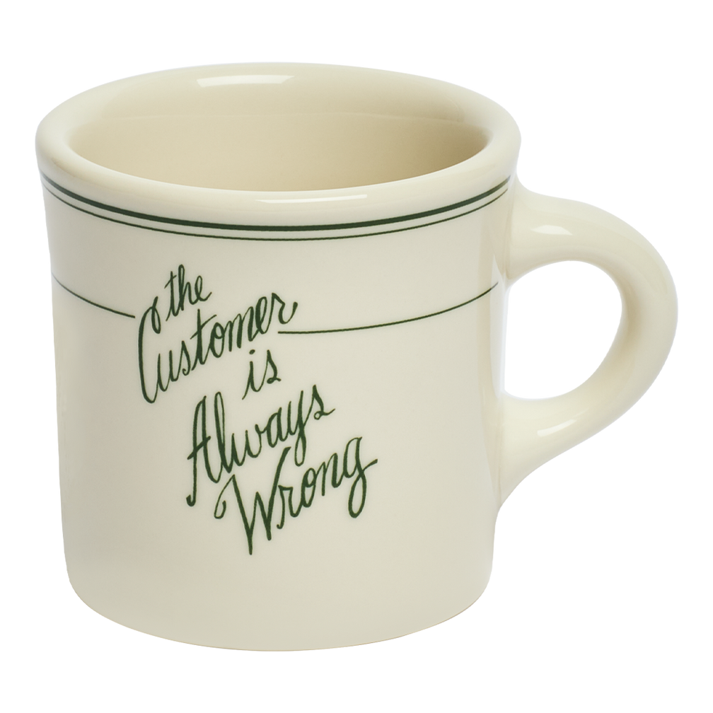 White mug with 'The Customer is Always Wrong' text on a white background