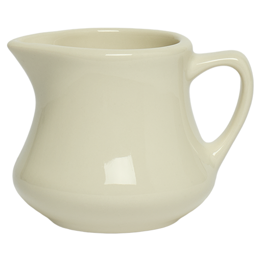 Cream-colored ceramic pitcher on a white background
