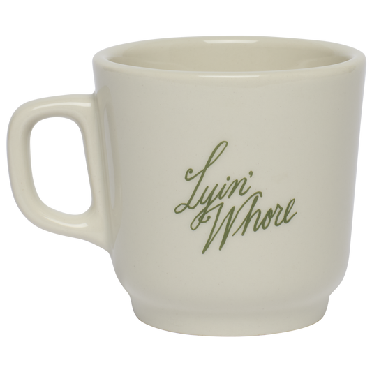 Close-up of Pleasantries - Lyin Whore Mug (12oz), ceramic mug with novelty text design